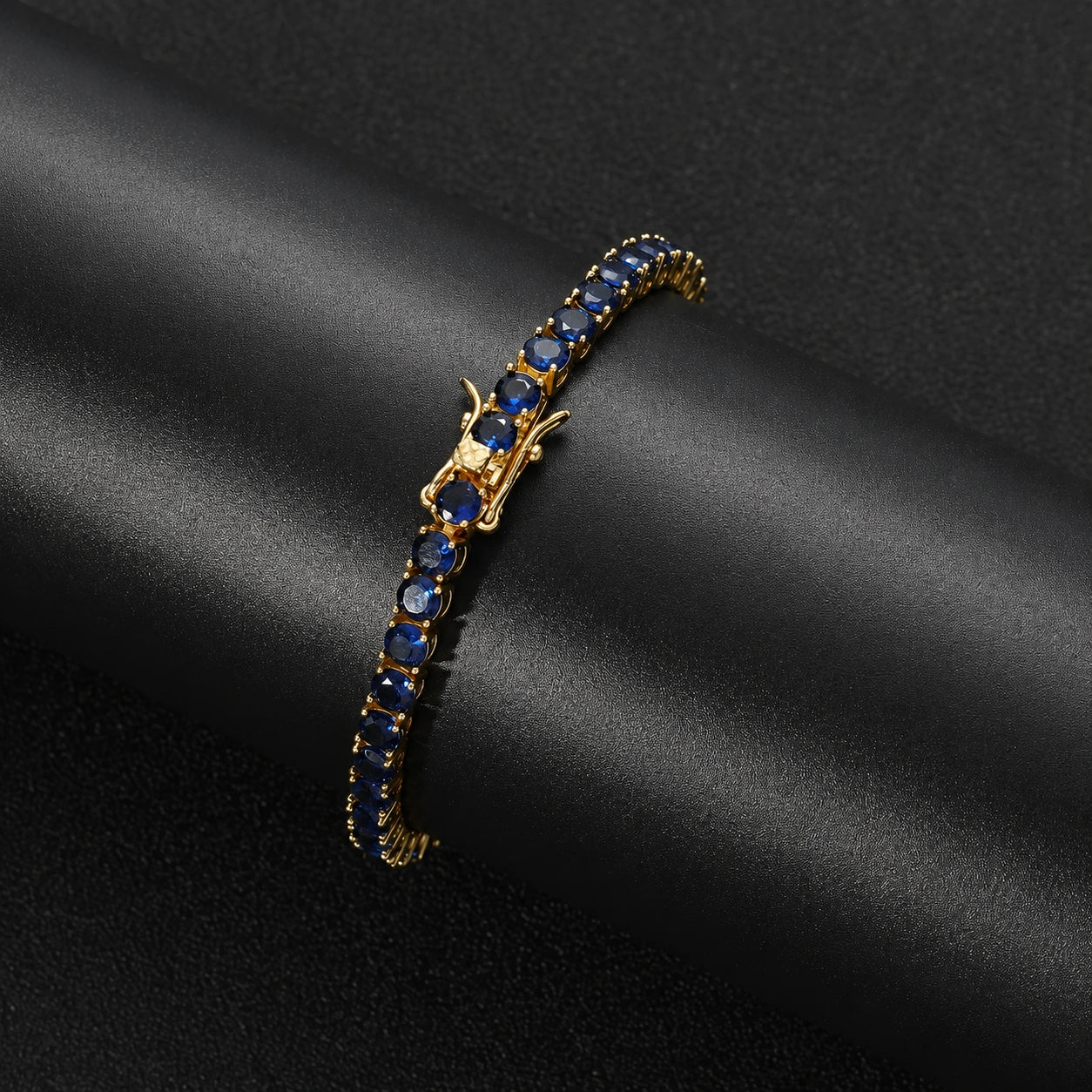 Pulsera tennis oro amarillo circones azules 18.5cm - 4mm