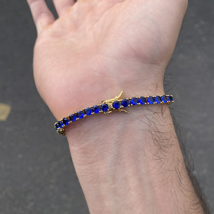 Pulsera tennis oro amarillo circones azules 18.5cm - 4mm