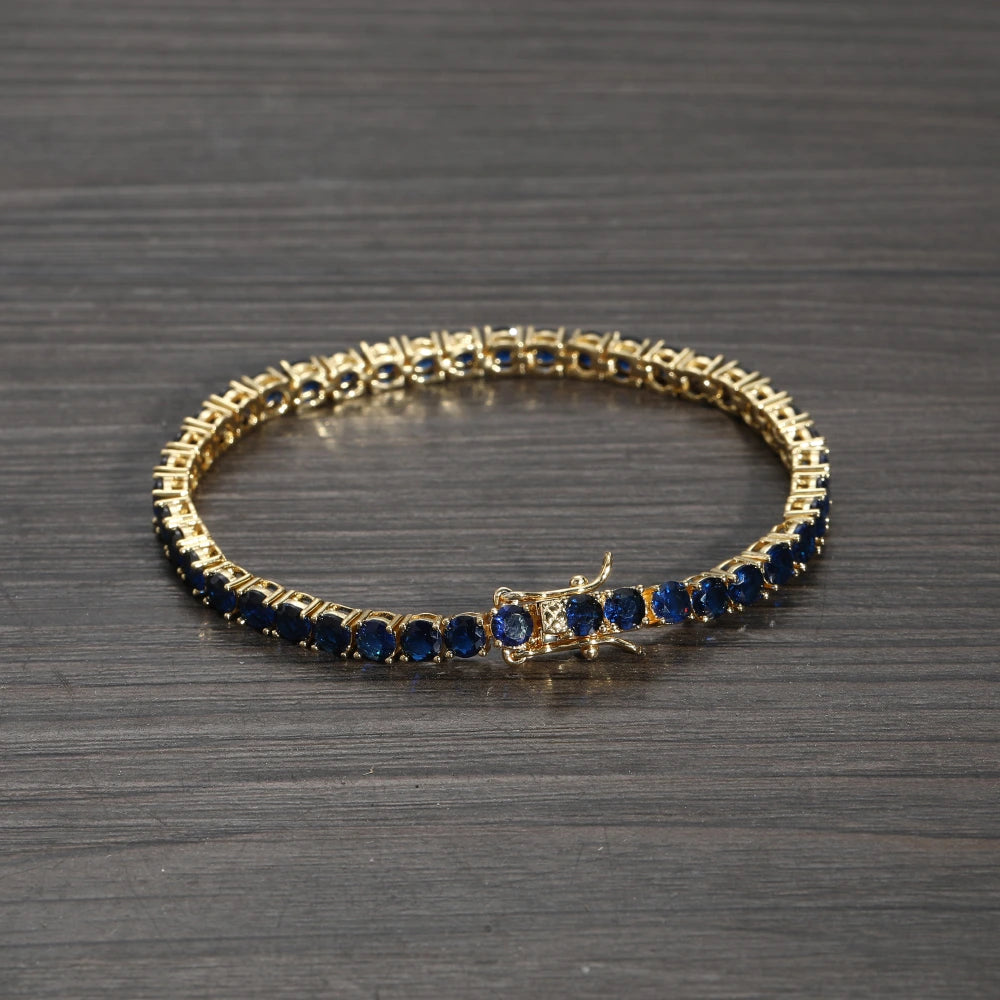 Pulsera tennis oro amarillo circones azules 18.5cm - 4mm