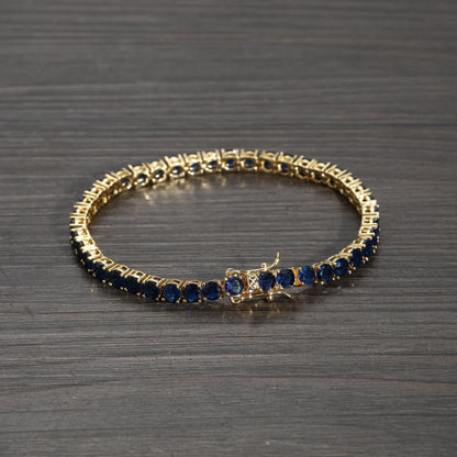 Pulsera tennis oro amarillo circones azules 18.5cm - 4mm